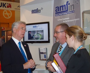 Business minister Michael Fallon meets Mike Beirns Amfin MAA stand Paris 2013